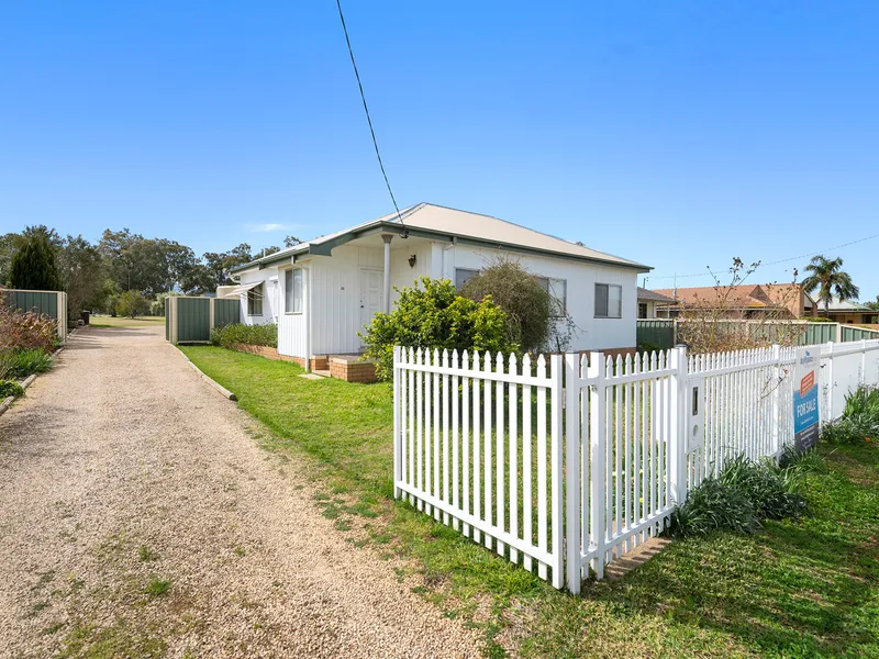 ½ Acre of Quality Family Living with Endless Potential 