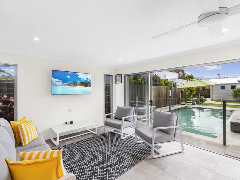 Just Two Rooftops From The Beach!