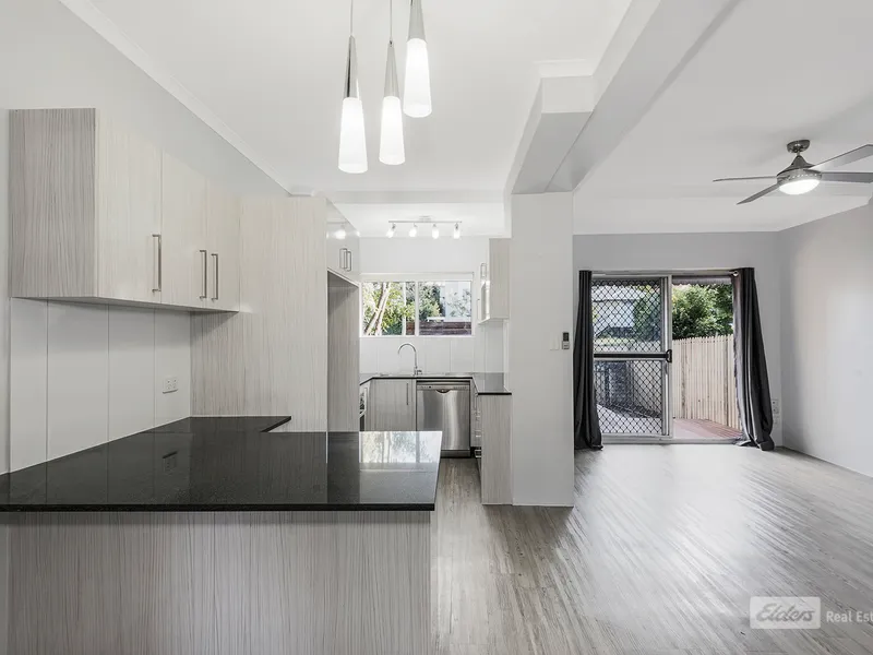 SENSATIONAL TOWNHOME IN IDEAL LOCATION
