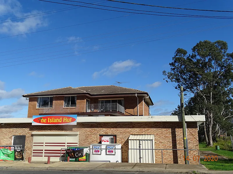 Flat located above shops