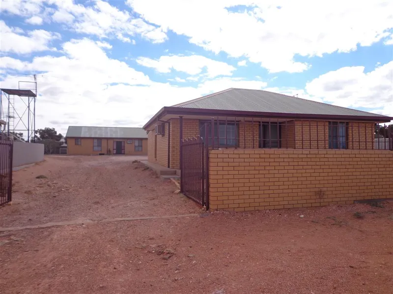 TWO brick homes on one title!
