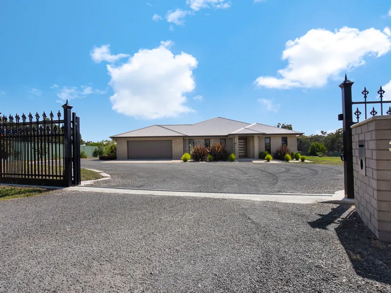 BEAUTIFULLY DESIGNED HOME IN SOUGHT AFTER AREA