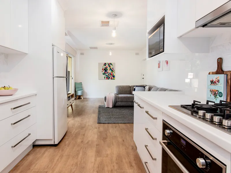 Ultimate Upgraded Unit in Lush Leafy Locale