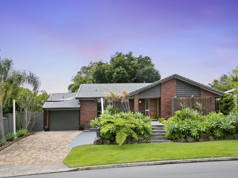 STYLISH INSIDE AND PARK LIKE SURROUNDS OUTSIDE