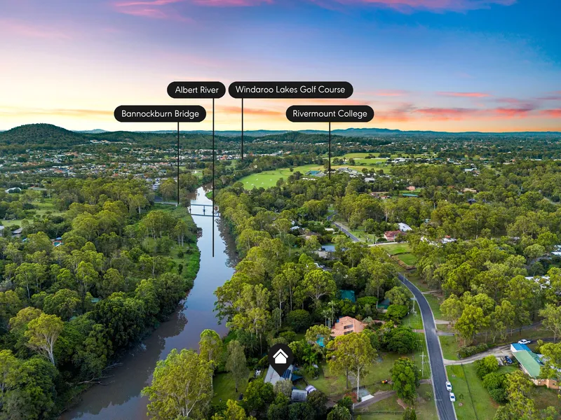 Riverfront acreage living!!