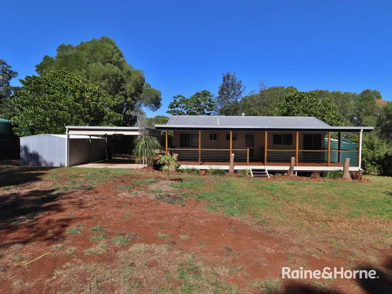 RENOVATED HOME SET ON AN ACRE