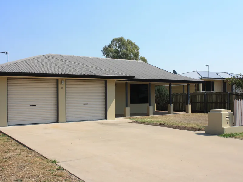 MODERN, ROOMY, EASY CARE HOME