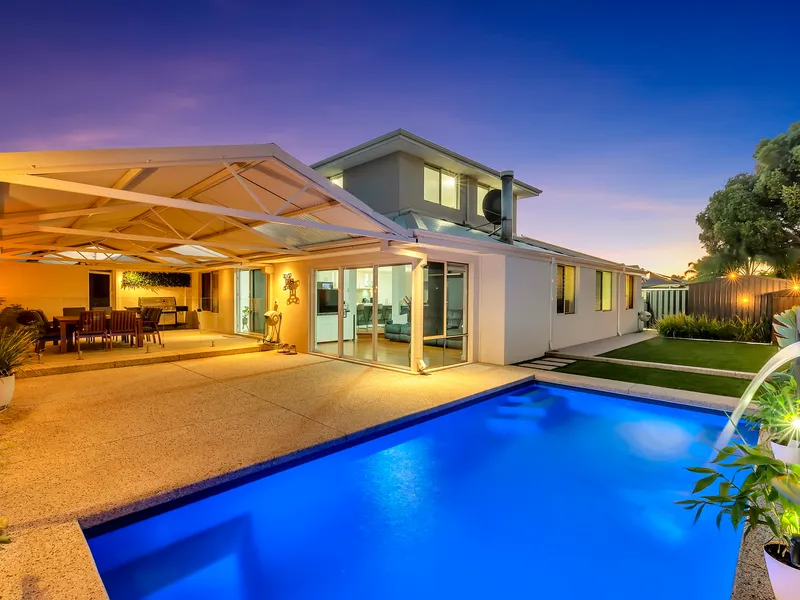 Impressive 5 bedroom plus study home with solar heated pool