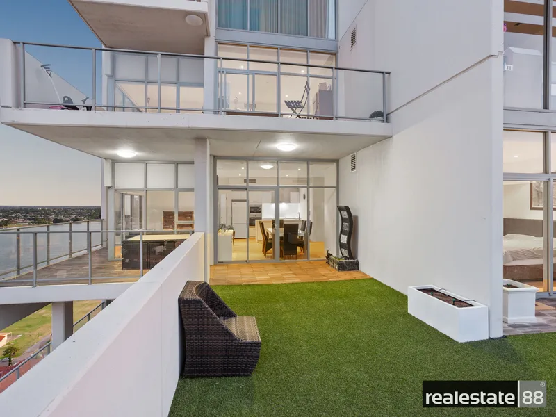 Elevated lifestyle with glistening Swan River views and a 64sqm North facing terrace!