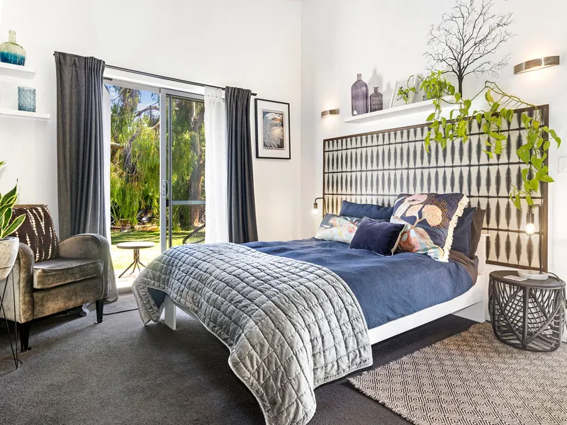 Modern build on large established block