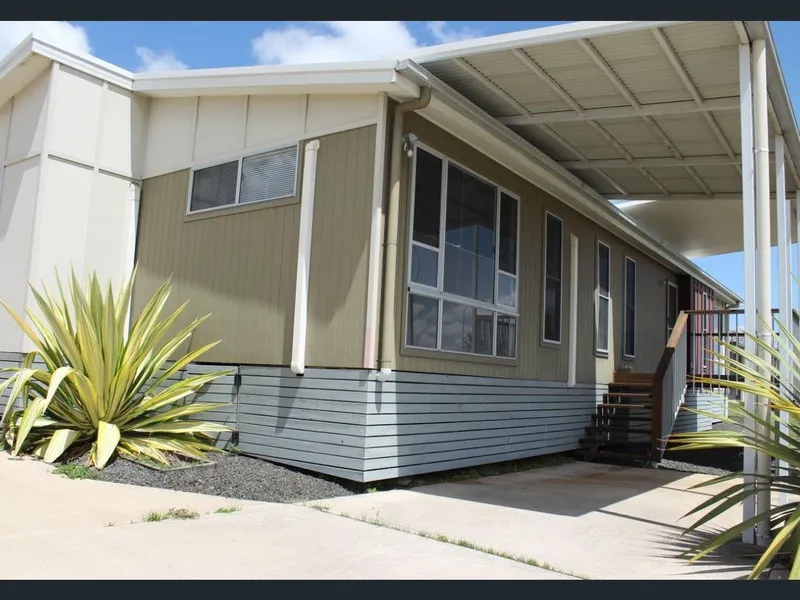 Covered Wooden Deck with Spacious Living