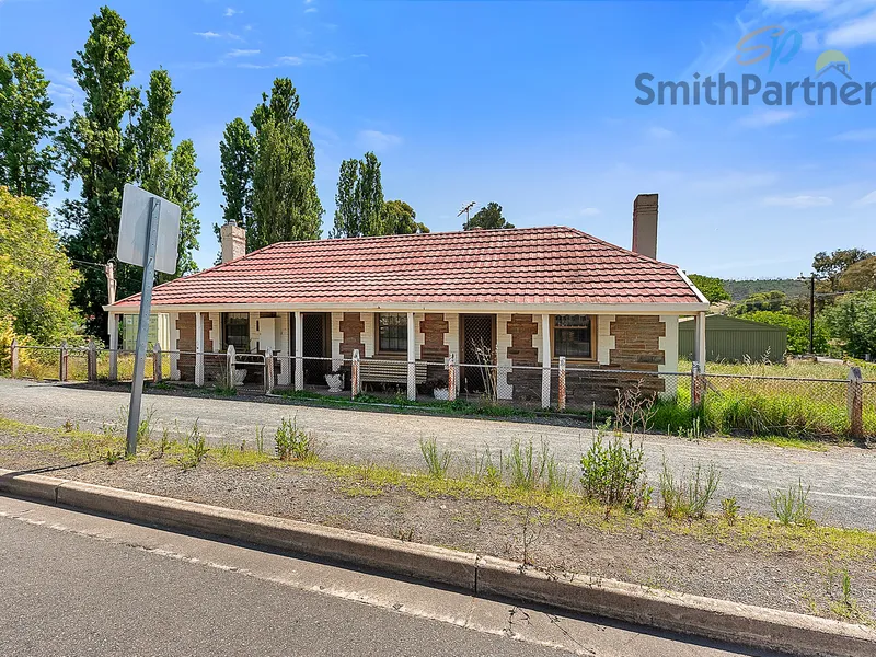 Revive the Timeless Elegance of this Character Home