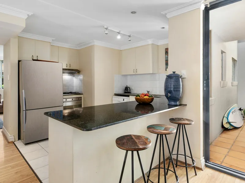 Life on the Beachfront in a walk-to-everywhere Setting