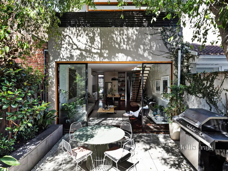 Stylish indoor-outdoor synergy in a leafy cul-de-sac