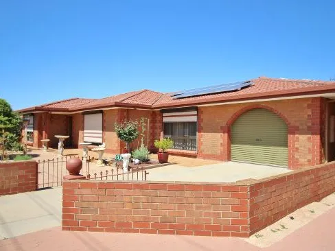 Large well presented family home with low maintenance yard and shedding