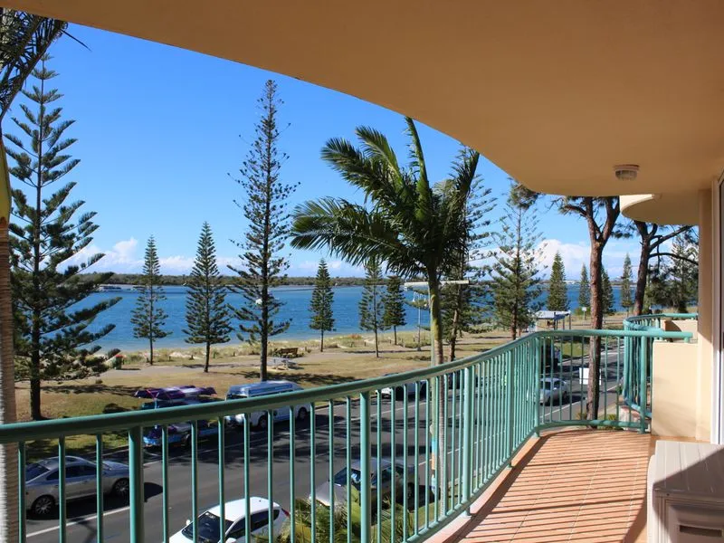 IMMACULATE TWO BEDROOM FULLY-FURNISHED WATER FRONT UNIT