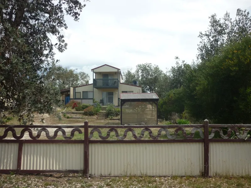 BEACH HOME WITH ESTABLISHED INCOME