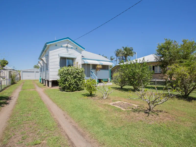 EXCELLENT STARTER HOME OR INVESTMENT WITH 3 BAYS OF SHED SPACE!
