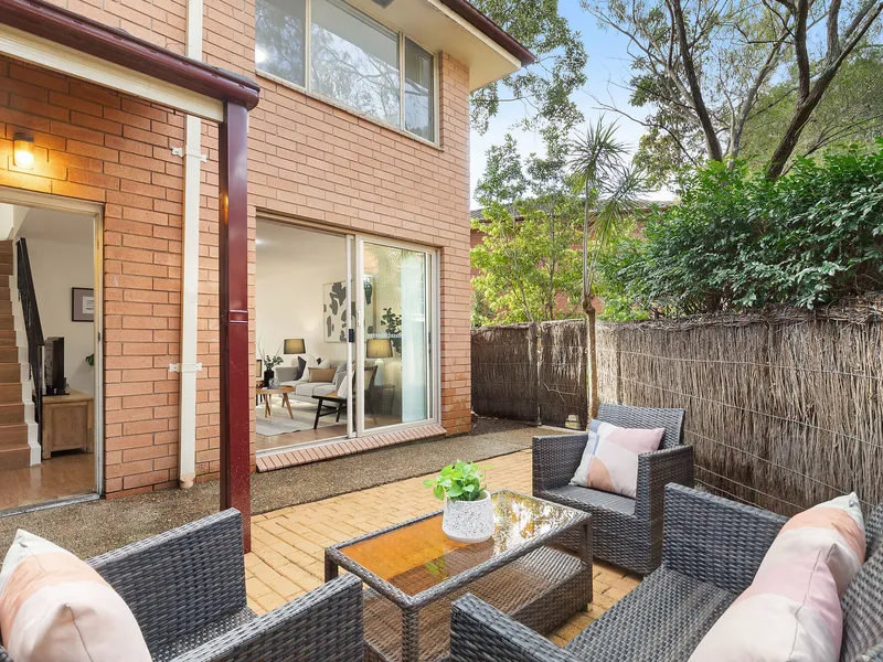 Renovated full brick townhouse in desirable estate