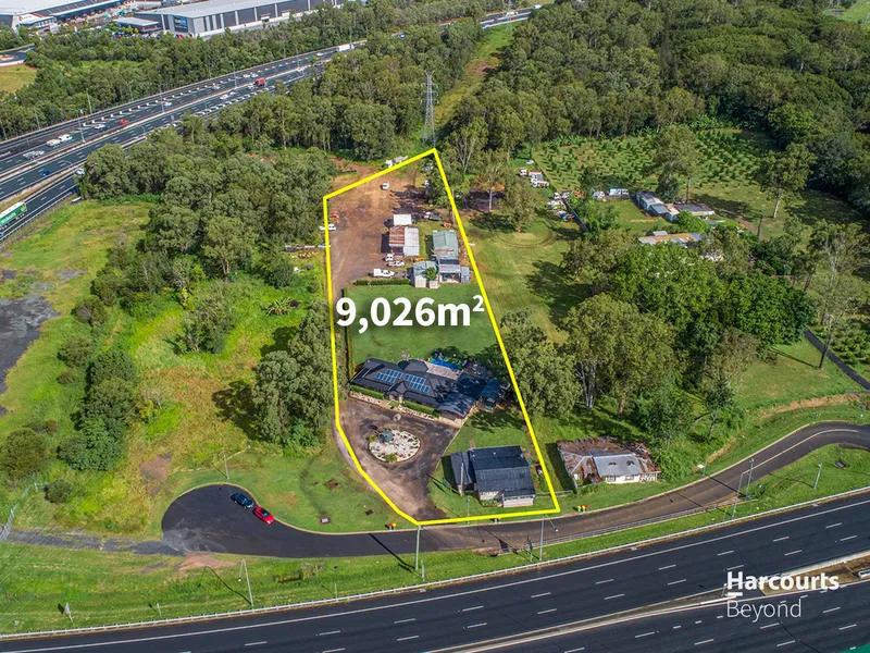 A House and Cottage on Immense Block of Prime Land