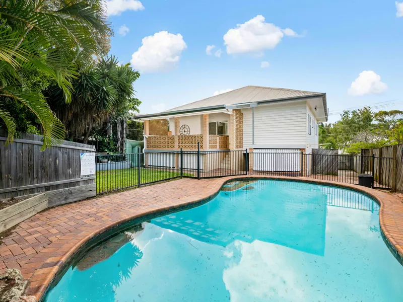 Family Home with Pool and Multiple Living Areas