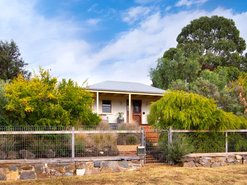 Generous country villa with Long Gully views, studio, and rear entry.