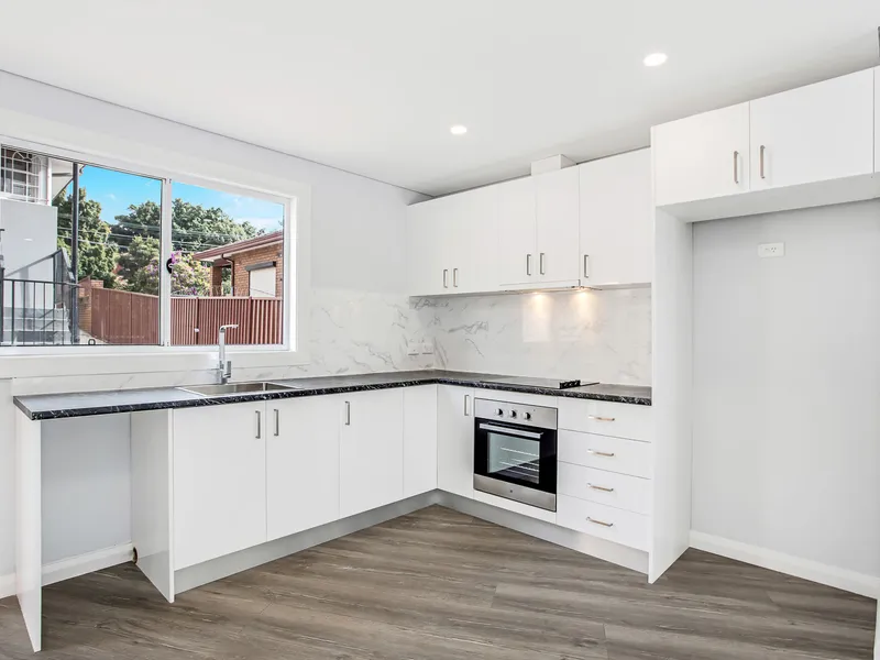 BRAND NEW HOME IN ULTRA CONVENIENT LOCATION