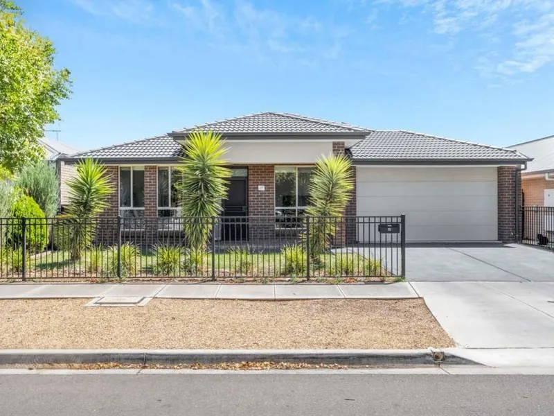 Huge Five Bedroom Home with Two Living Areas and a Decent Rear Yard!
