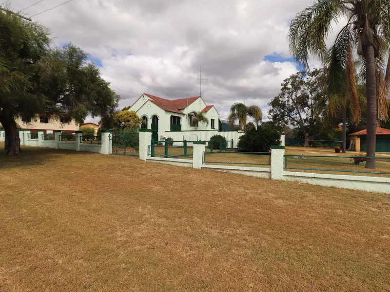 QUALITY 1930’S HOME ON 3 TITLES WITH 2 STREET ACCESS