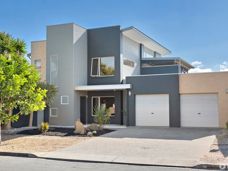 Architectural Beachfront Beauty – One Of A Kind!