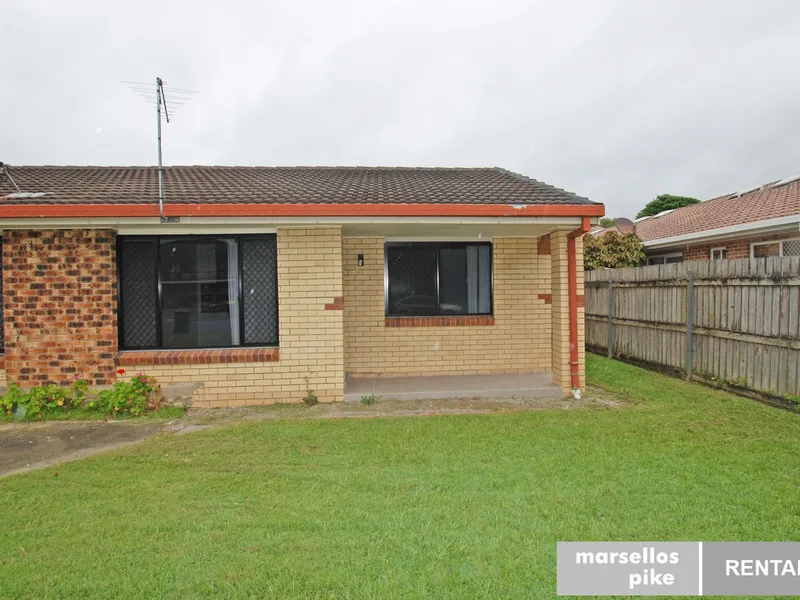 Modern duplex with mowing package!