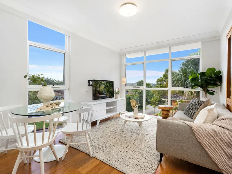 Immaculate apartment with double lock up garage in prime coastal locale
