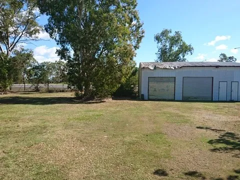 BRUCE HIGHWAY FRONTAGE WITH SHED