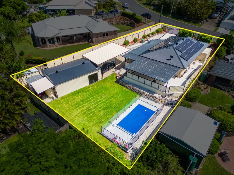 Ultra - modern renovation with the 'WOW' factors. Elevated family home on a huge 868m2 block + pool & sheds!