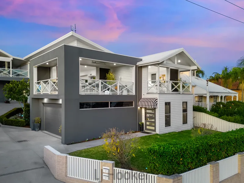Cutting-Edge Retreat Backdropped by the Lake's Glassy Water
