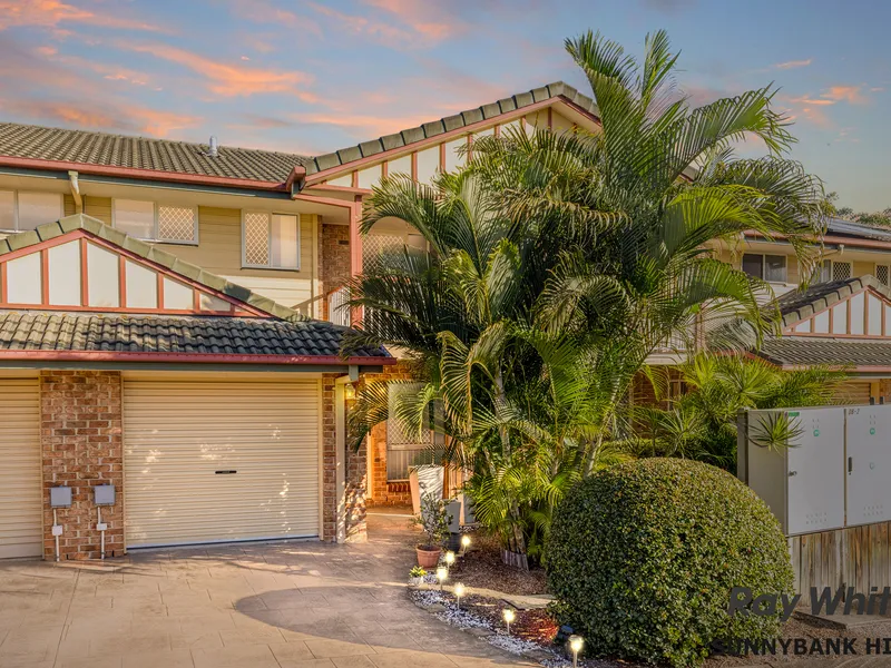 Sensational three-bedroom townhome in quiet gated community