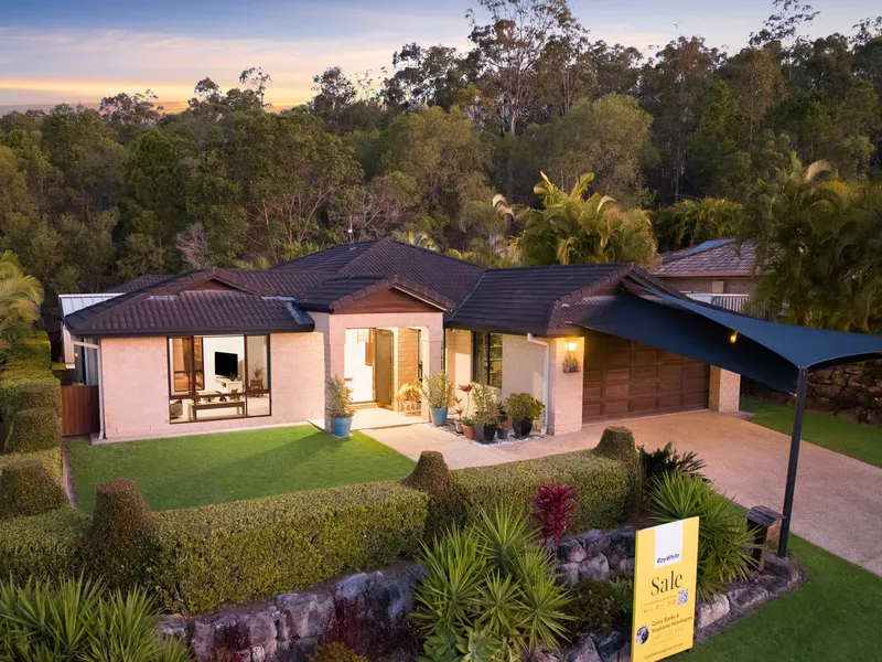 STUNNING HOME WITH AN EBUNDANCE OF PRIVACY WITH 2 ENTERTAINEMENT AREAS!