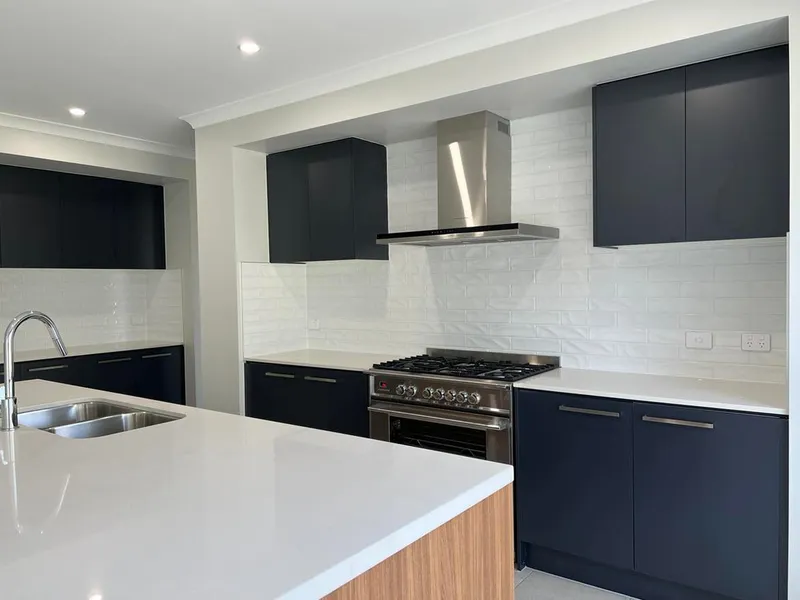 OUTSTANDING NEW HOME WITH STUNNING VIEWS IN SOUGHT AFTER WOODHILL ESTATE