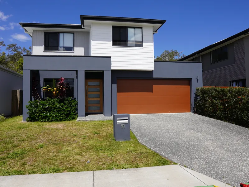 AS NEW 4 BEDROOM HOME IN ARUNDEL SPRINGS WITH DUCTED AIRCON