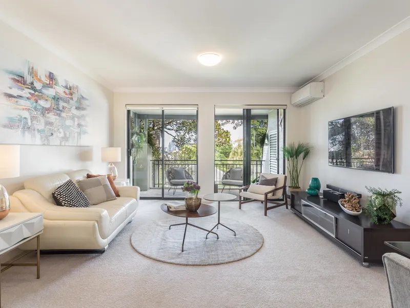 Immaculate apartment in peaceful complex with city views