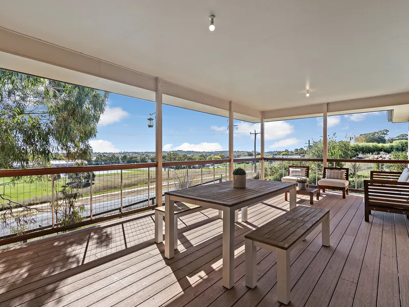 A beautifully presented contemporary home located in an elevated position overlooking Orange.