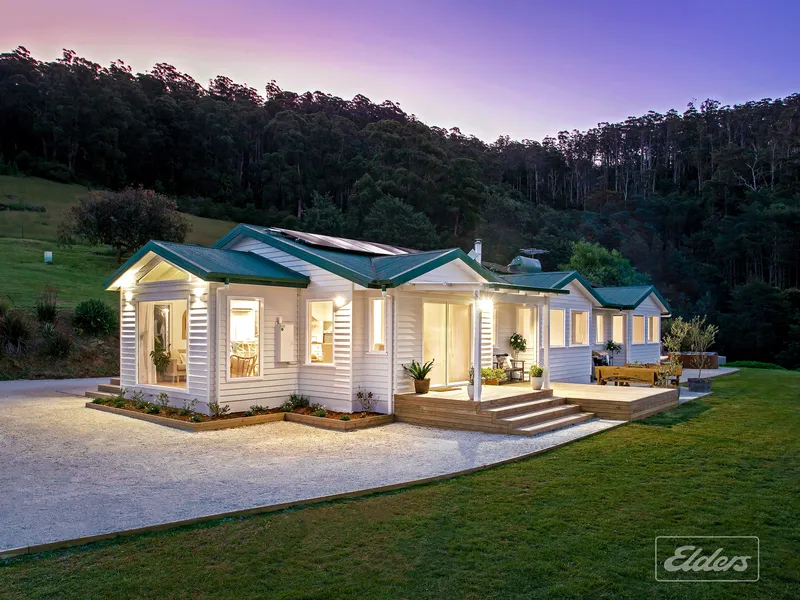 “TRULY BREATH TAKING” DESCRIBES THIS UNIQUE PRIVATE HOBBY FARM ON 31 ACRES…