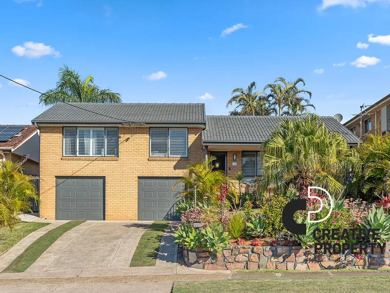 Elegantly Renovated Split-Level Residence in Sought-After Location