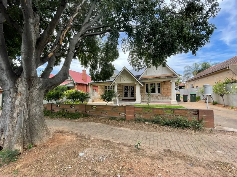 Location, Location, Location Tudor Style Home