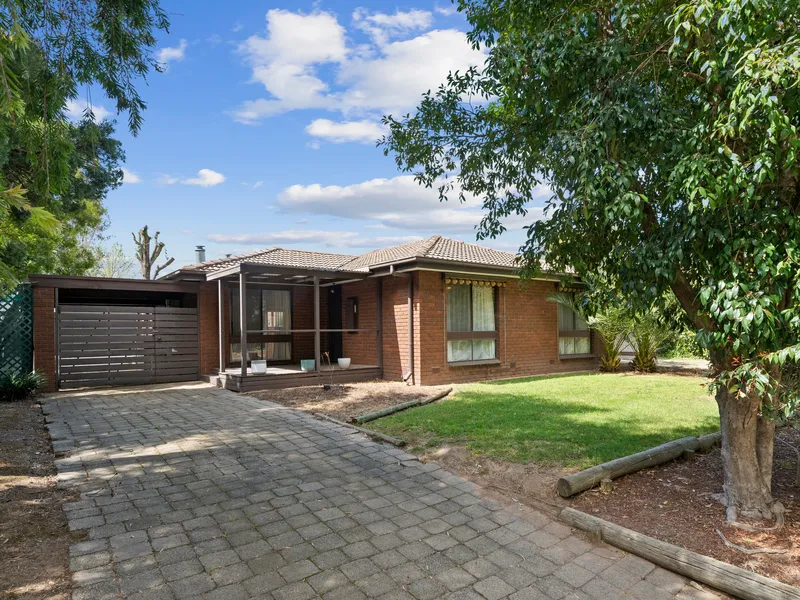 AFFORDABLE BRICK HOME EQUIPPED WITH LARGE SHEDDING