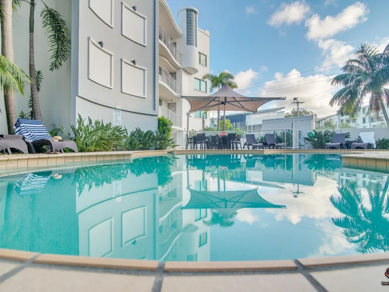 Beachside apartment with Private Courtyard.