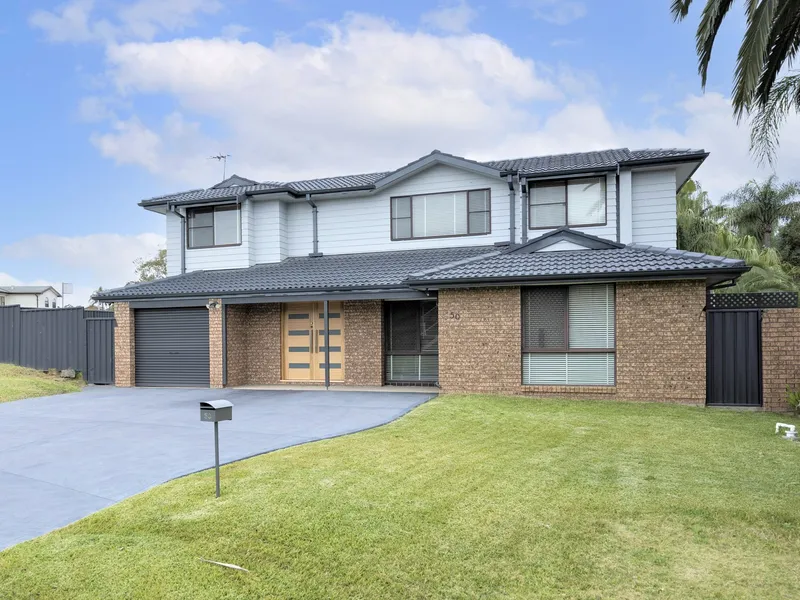 MODERN UPDATED HOME WITH BEAUITFUL FINISHES!