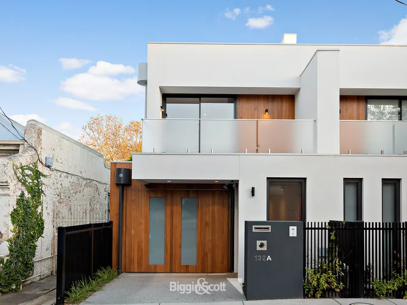 STUNNING BOUTIQUE 3 BEDROOM HOME WITH SPACIOUS LIVING, PRIVATE COURTYARD, ROOFTOP TERRACE AND 2 OFF STREET CAR SPACES IN PERFECT LOCATION!