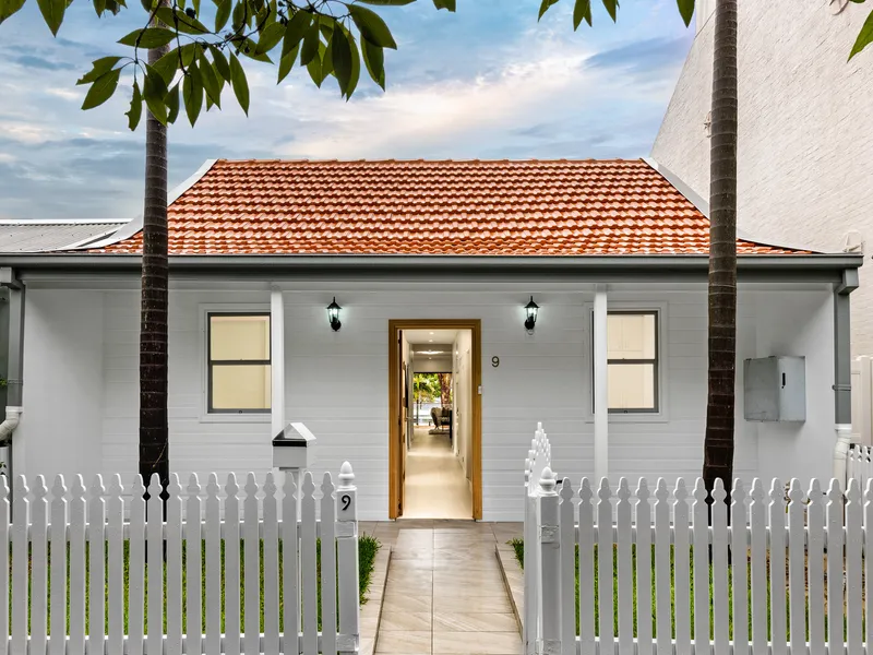 A fully renovated home behind an attractive character facade