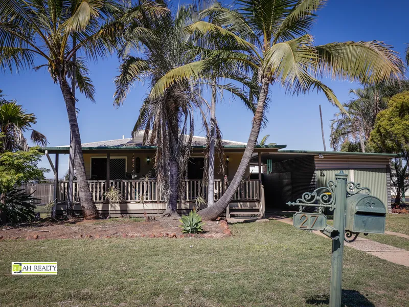 LOVELY 3 BEDROOM HOME WITH TIMBER VERANDAH AND LOCK-UP GARAGE.